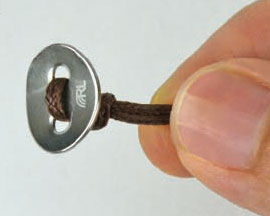 button knotted onto cord